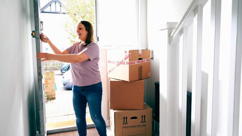 woman moves into new home